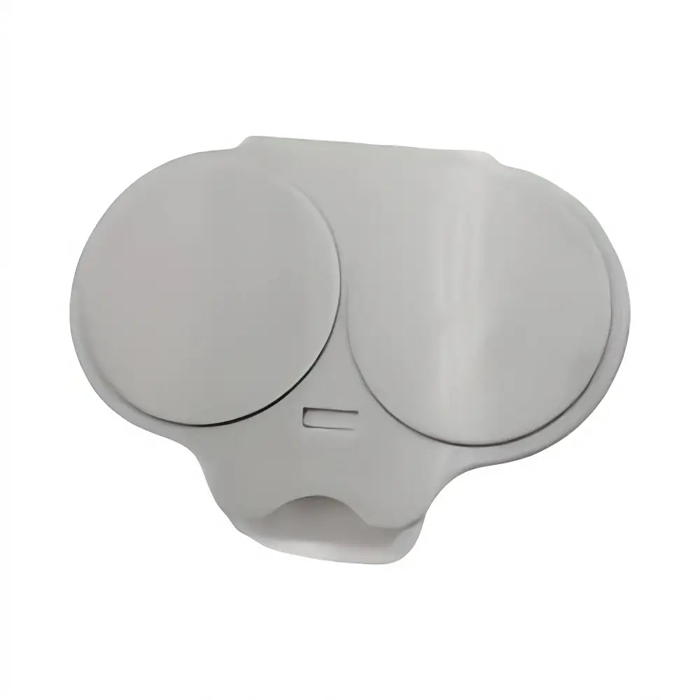 A light gray plastic replacement cover or cap with two circular domed sections and a small rectangular slot, shown on a plain white background.