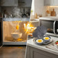 A split-screen kitchen scene comparing a broken microwave with a gray egg-catcher pan. The left side shows a microwave with a cracked bowl inside, steam, and spilled yellow contents, with a large gold 'VS' overlay.