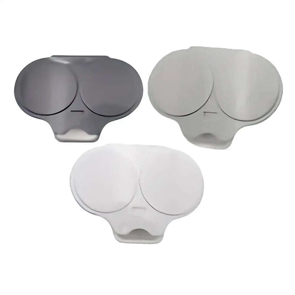 Three oval-shaped replacement lens covers for eyeglasses shown in dark gray, light gray, and white, arranged on a plain white background.