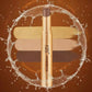 A gold makeup eyeshadow stick with a brown shade, surrounded by a water splash graphic on a brown background with three eyeshadow color swatches.