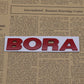 Bora - Emblem Sticker Badge, Funny Decals for Car, Truck, SUV, Motorcycle - TE032