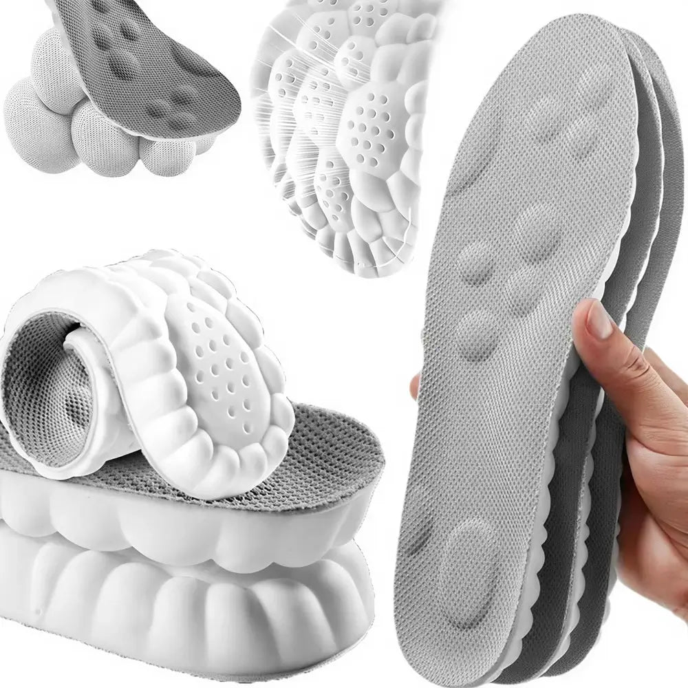 Gray and white textured insoles shown in multiple views, including a close-up of the underside, a rolled section, and a hand holding a pair. The product appears to be a pair of contoured support or massage insoles with cushioned raised sections and a textured lower surface.