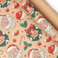 Christmas wrapping paper used to wrap a holiday gift box