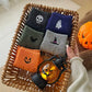 Multicolor women's Halloween socks in muted seasonal shades