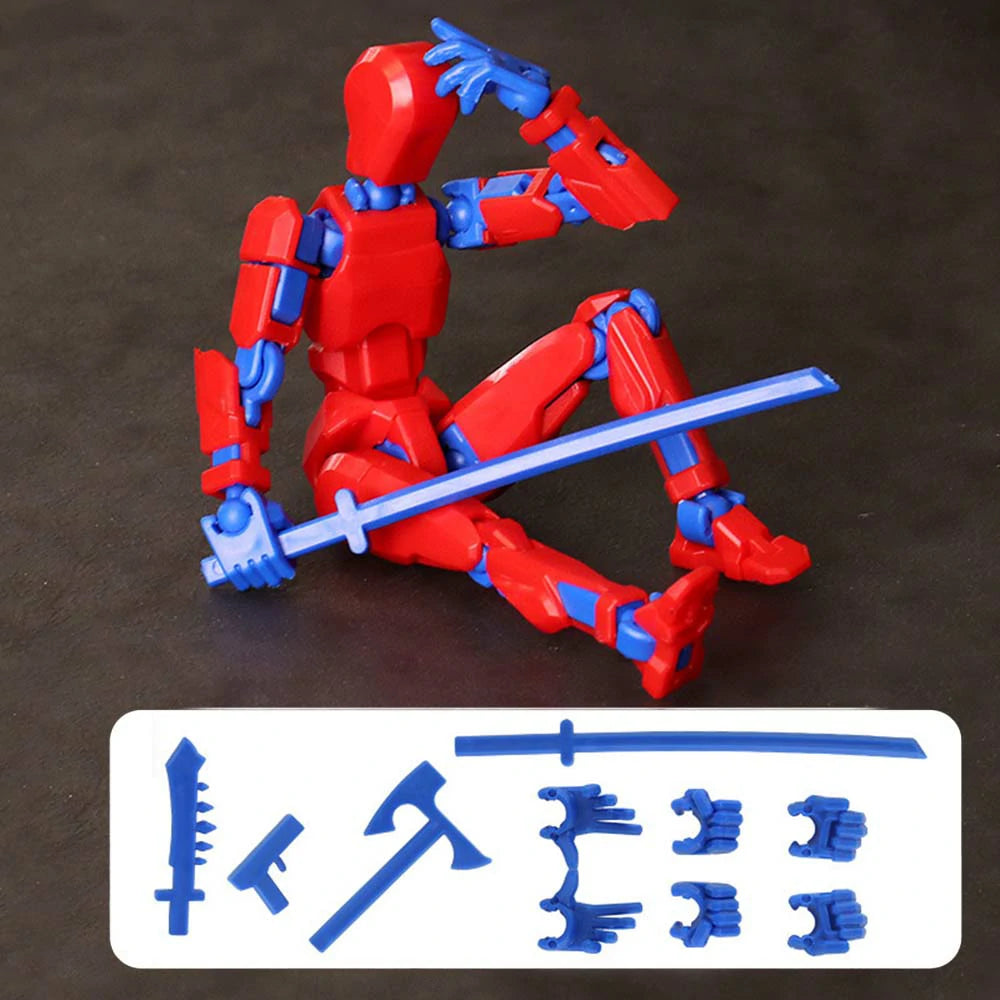 A red and blue plastic articulated action figure posed sitting and holding a sword, shown on a dark surface with a white panel below displaying interchangeable blue accessories.
