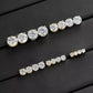 Four-prong setting on a round lab-created moissanite stud earring
