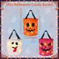Three illuminated Halloween candy buckets shown on a light blue background with ghost and witch motifs, plus measurement labels. The top bucket is orange with a jack-o'-lantern face and black handles; the bottom left bucket is white with a ghost face and red tongue; the bottom right bucket is pink with a pumpkin face.