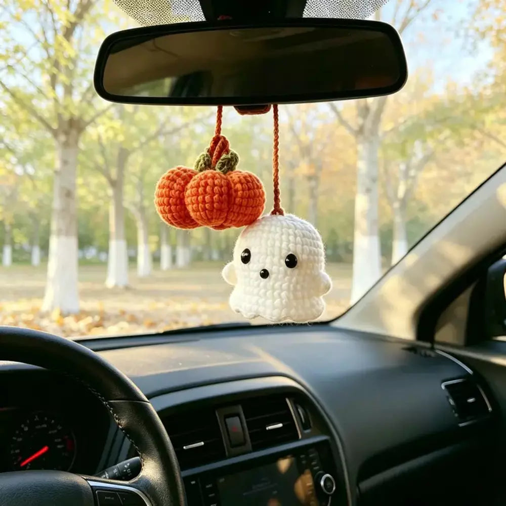 Cute crochet ghost ornament with a pumpkin for Halloween car decor