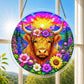 A round acrylic suncatcher with a fluffy highland cow wearing a flower crown surrounded by wildflowers hanging from a chain in front of a bright white window