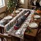 A quilted table runner with track snowy pines tunnel and a toy steam train puffing smoke on a dining table decorated with candles wreath and Christmas tree