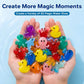 A pair of hands holding a collection of colorful, translucent plastic water toy creatures, including yellow ducks, red crabs, blue octopus, and green sea creatures, set against a light blue water-textured background with promotional text at the top.