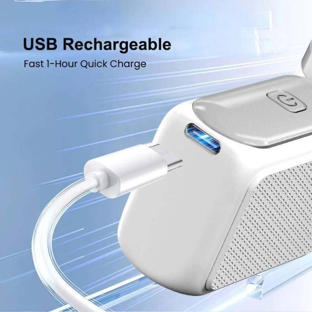A white portable speaker shown with a USB charging cable plugged in, on a light blue graphic background with text reading 'USB Rechargeable' and 'Fast 1-Hour Quick Charge'.