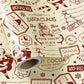Christmas wrapping paper featuring a Santa Claus design