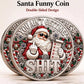 Close-up view of Santa artwork and lettering on the novelty coin