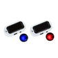 Two small white solar-powered light devices with black solar panels, shown on a white background with blue and red illuminated light circles below each unit.