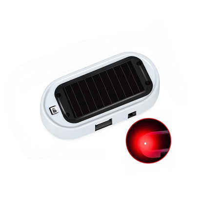 A white and black solar-powered device with a circular inset showing a red light beam, set against a plain white background.