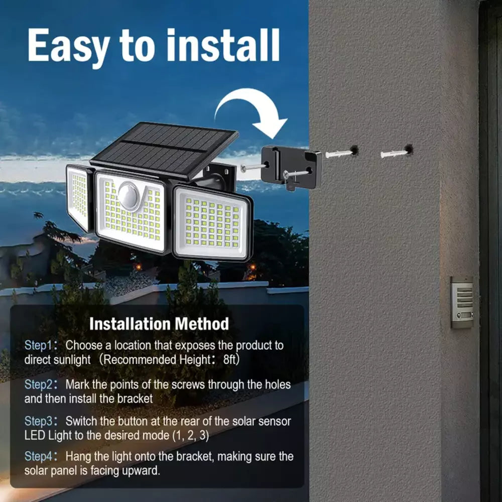 Solar security spotlight mounted on an exterior garage wall