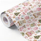 Christmas gift wrap featuring a teddy bear holiday design